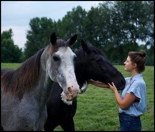 Kristen Houser with 2 horses